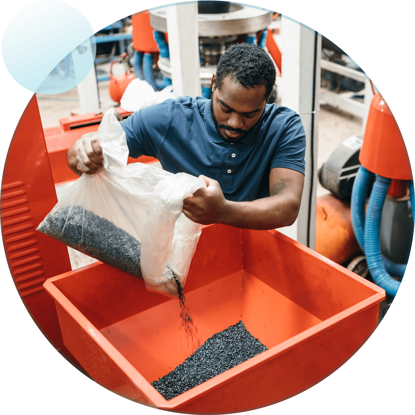 Man pouring pellets into red container